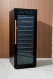 Front of the cabinet with the digital control panel and glass door