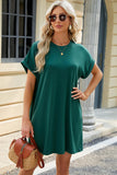 Solid color round neck pocket loose short sleeved dress
